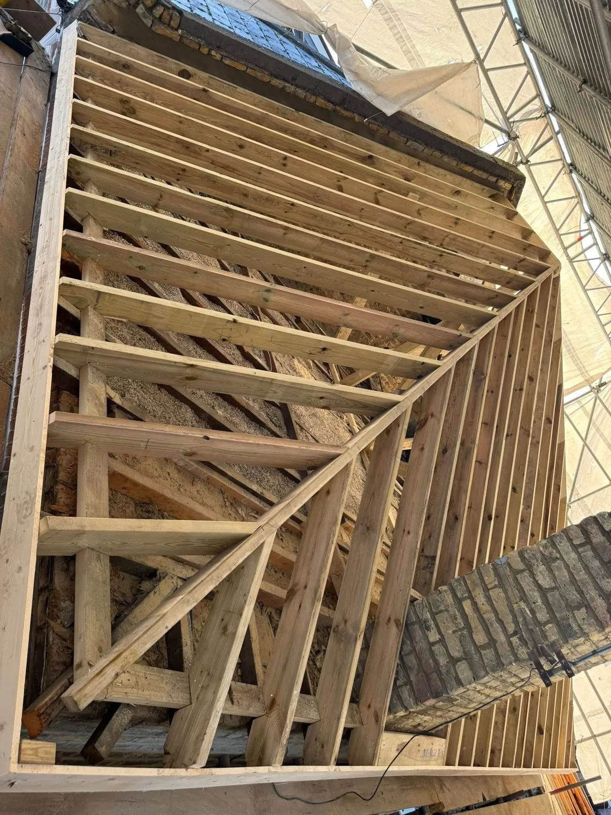 New roof timbers and rafters during a re-roof in Callington